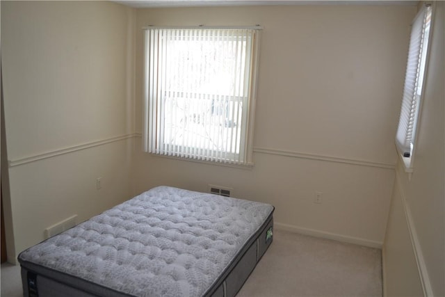 86 Everwild Ln, Greece, NY 14616 - bedroom featuring baseboards, visible vents, and light carpet