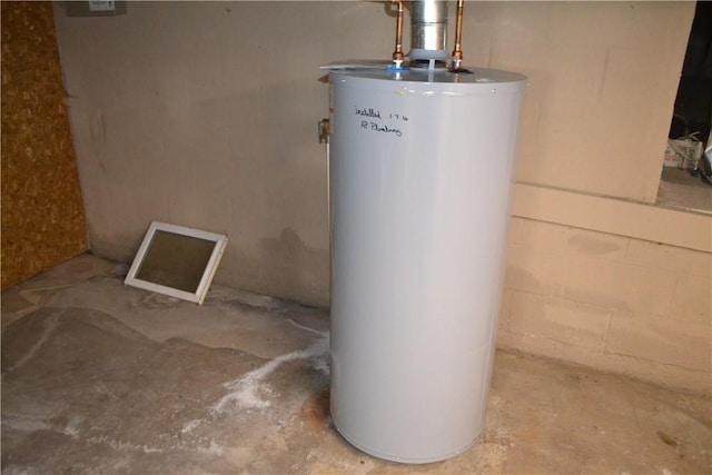 86 Everwild Ln, Greece, NY 14616 - utility room featuring water heater
