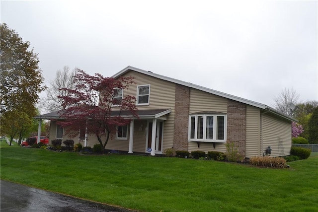 86 Everwild Ln, Greece, NY 14616 - view of front of home with a front lawn