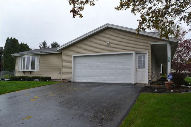 86 Everwild Ln, Greece, NY 14616 - view of front of property with an attached garage, a front yard, and aphalt driveway