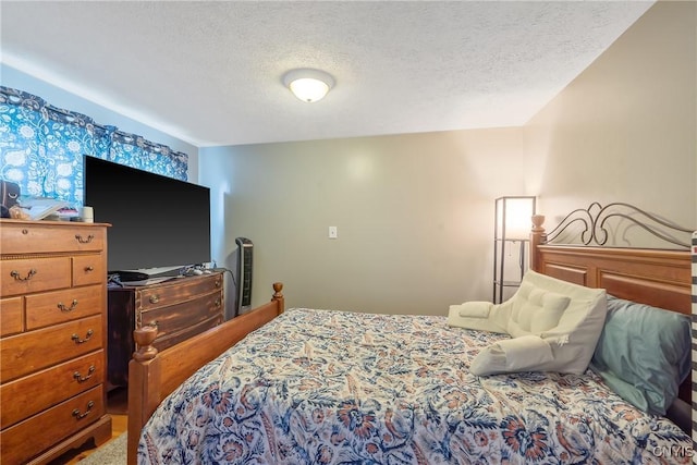 bedroom featuring a textured ceiling