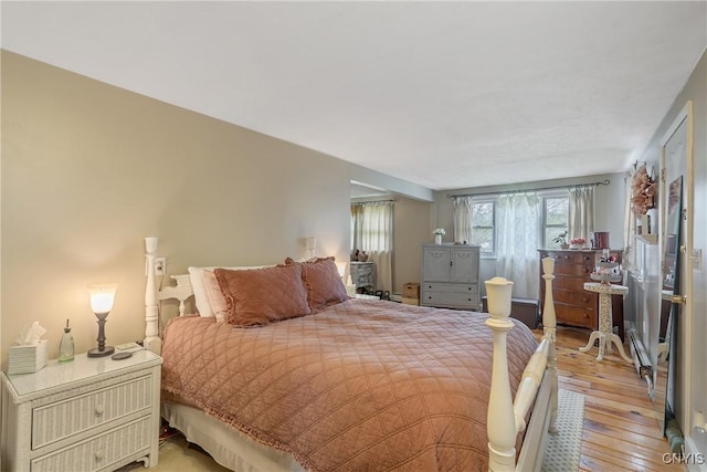bedroom featuring light wood finished floors