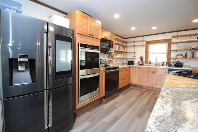 200 Mertz Rd, Bainbridge, NY 13733 - kitchen with open shelves, light brown cabinets, recessed lighting, light wood-style flooring, and stainless steel appliances