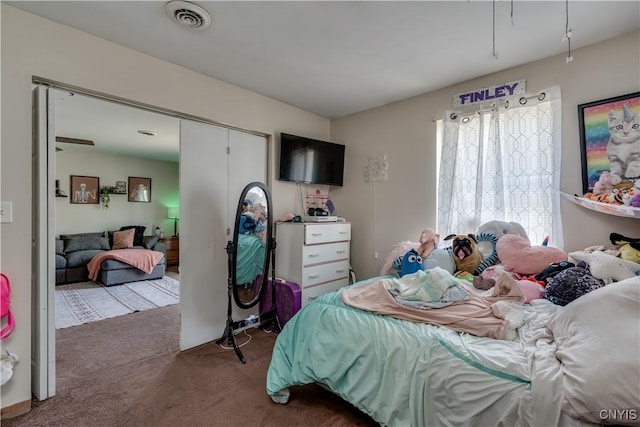 25082 Ridge Rd, Watertown-Town, NY 13601 - bedroom featuring carpet floors, visible vents, and a closet