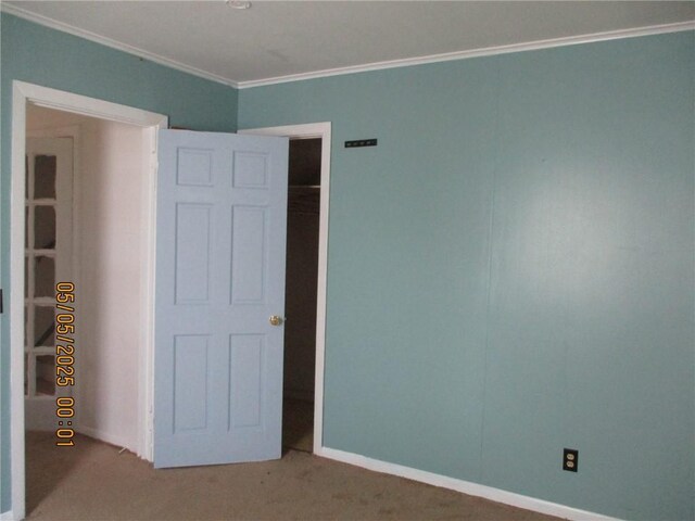 26 Balcom Ave, Corning, NY 14830 - unfurnished bedroom featuring ornamental molding, carpet flooring, and baseboards