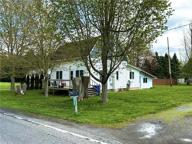 view of front of property with a front lawn