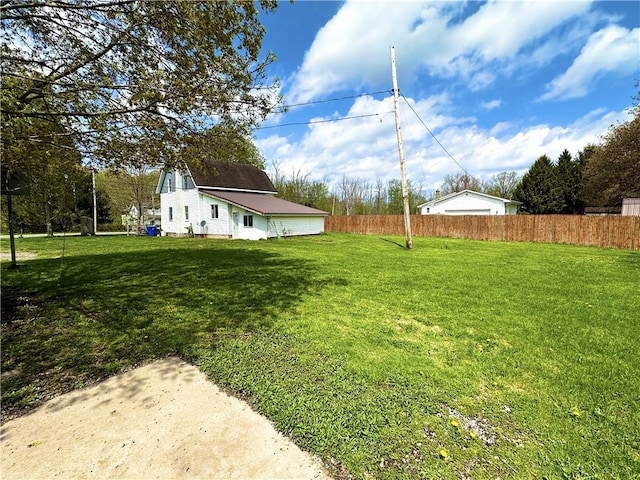 view of yard with fence