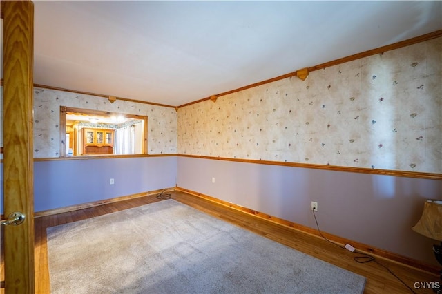 11511 State Route 26, Ava, NY 13303 - unfurnished room featuring crown molding, baseboards, and wood finished floors