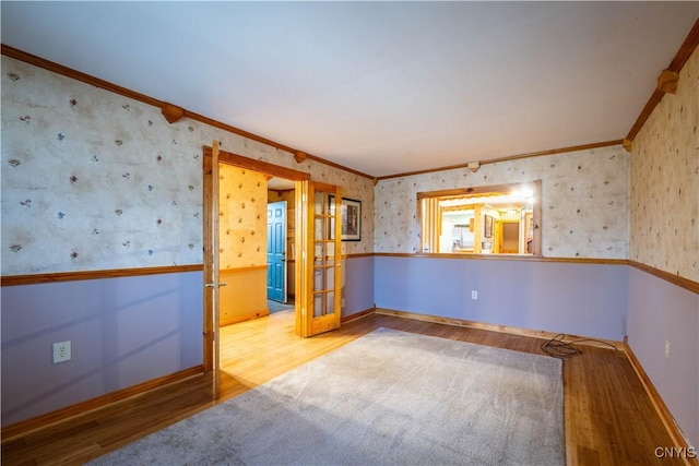 11511 State Route 26, Ava, NY 13303 - unfurnished room featuring baseboards, ornamental molding, french doors, and wood finished floors