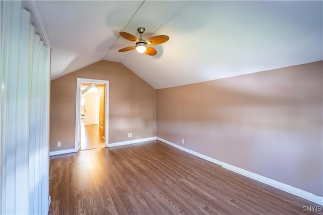 11511 State Route 26, Ava, NY 13303 - additional living space featuring vaulted ceiling, baseboards, a ceiling fan, and dark wood-type flooring