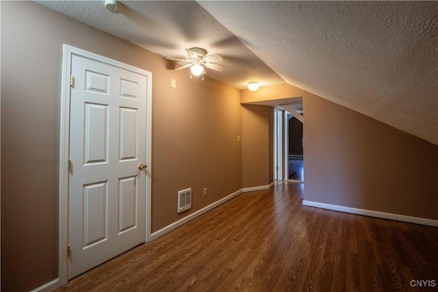 11511 State Route 26, Ava, NY 13303 - additional living space featuring a textured ceiling, ceiling fan, wood finished floors, and lofted ceiling
