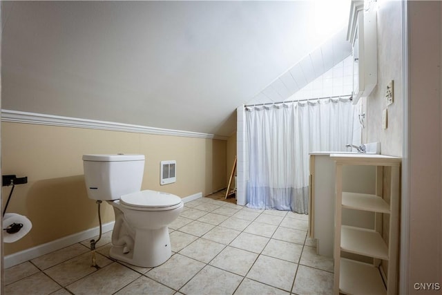 11511 State Route 26, Ava, NY 13303 - bathroom featuring toilet, tile patterned floors, baseboards, heating unit, and lofted ceiling