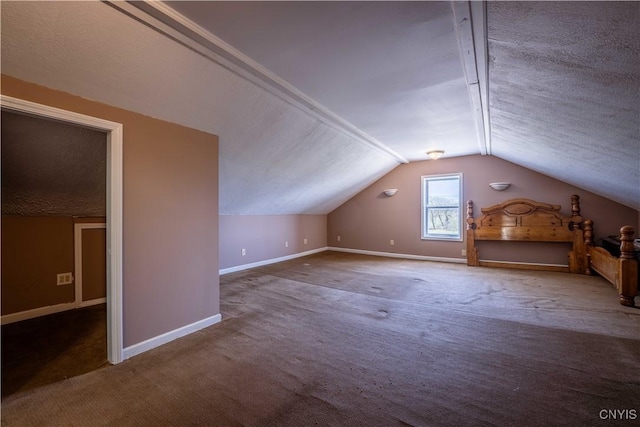 11511 State Route 26, Ava, NY 13303 - additional living space featuring baseboards, carpet, a textured ceiling, and lofted ceiling