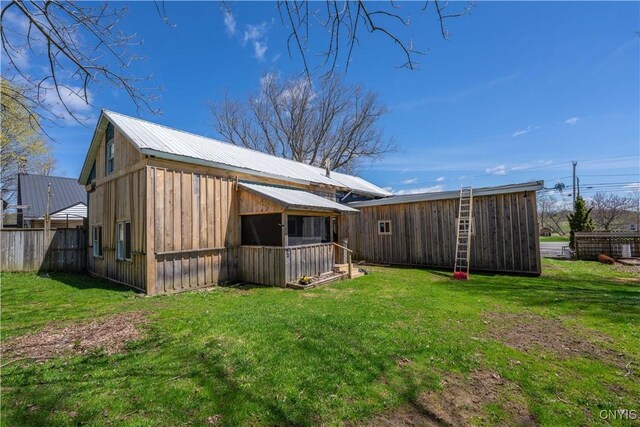 11511 State Route 26, Ava, NY 13303 - back of house featuring fence, a yard, and metal roof