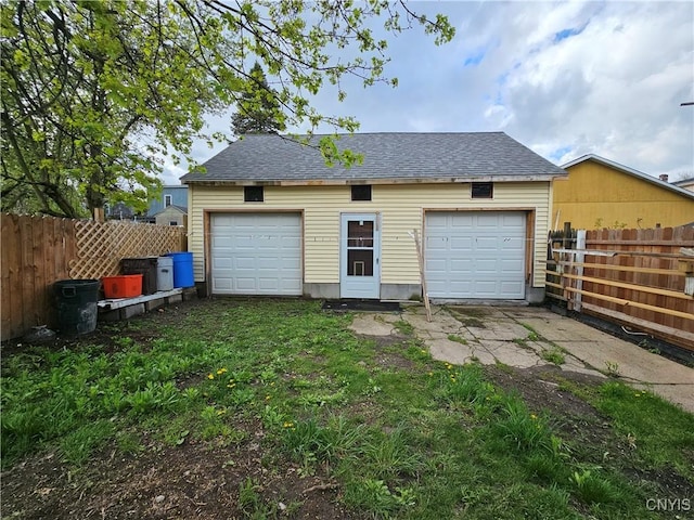 detached garage with fence