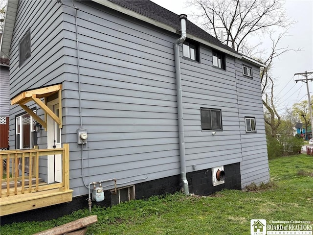 337 N 6th St, Olean-City, NY 14760 - view of property exterior with a lawn and a wooden deck