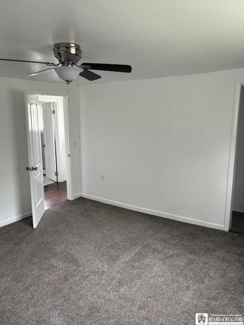 unfurnished bedroom featuring baseboards, ceiling fan, and dark carpet