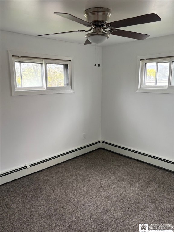unfurnished room featuring ceiling fan, baseboard heating, and carpet flooring