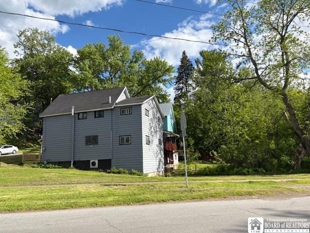 337 N 6th St, Olean-City, NY 14760 - view of home's exterior featuring a lawn