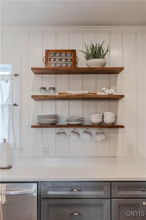 interior details featuring open shelves, gray cabinetry, and dishwasher