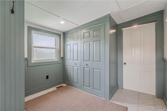 unfurnished bedroom featuring a closet, carpet flooring, visible vents, and recessed lighting