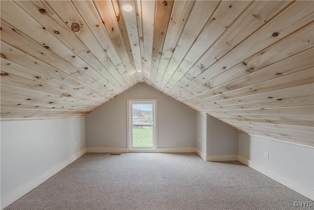 additional living space featuring light colored carpet, wooden ceiling, and lofted ceiling