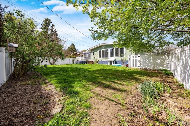 view of yard featuring a fenced backyard