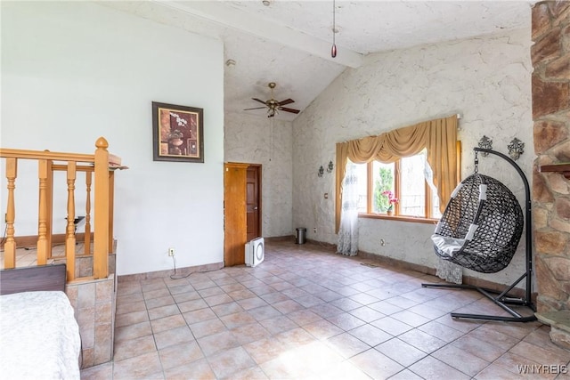 interior space with light tile patterned floors, beam ceiling, high vaulted ceiling, and ceiling fan