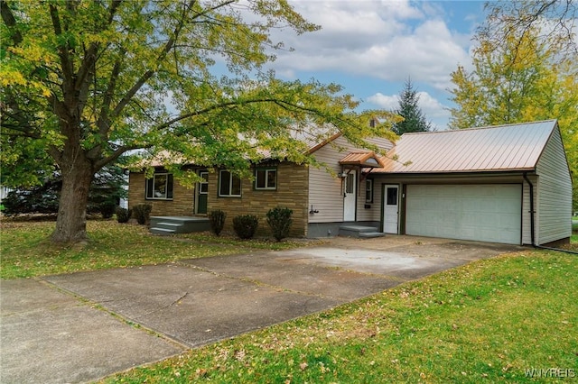 38 Carol Ave, Pomfret, NY 14063 - view of front of property with driveway, an attached garage, and a front lawn
