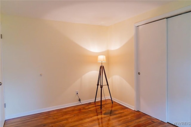 38 Carol Ave, Pomfret, NY 14063 - unfurnished bedroom featuring wood finished floors, baseboards, and a closet