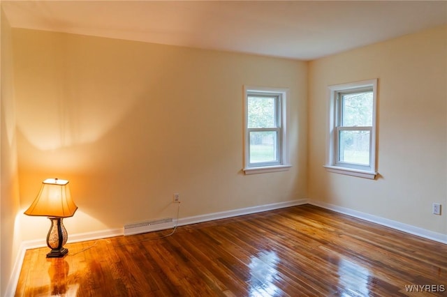 38 Carol Ave, Pomfret, NY 14063 - empty room featuring dark wood finished floors and baseboards