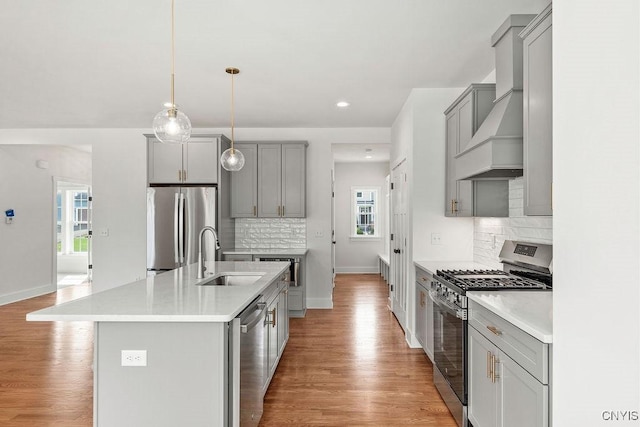 LOT379TIMBERBANKS 8032 Forest Rdg, Lysander, NY 13027 - kitchen featuring gray cabinetry, appliances with stainless steel finishes, a sink, and premium range hood