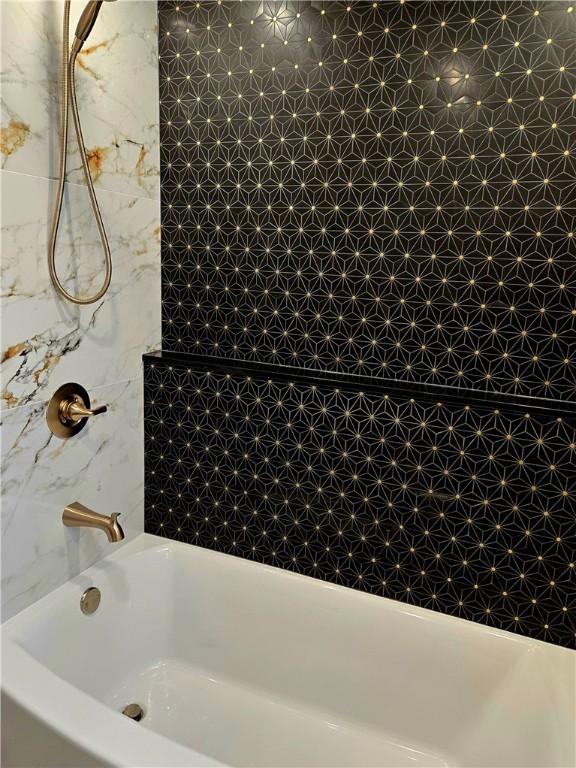 bathroom featuring bathtub / shower combination