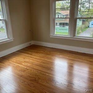 118 Ruhamah Ave, Onondaga, NY 13205 - spare room featuring baseboards and wood finished floors