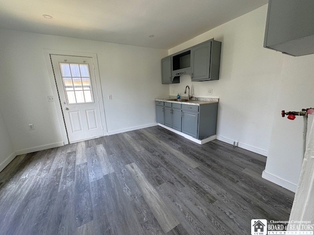 184 W 2nd St, Dunkirk-City, NY 14048 - interior space with light countertops, baseboards, dark wood-style floors, and gray cabinets