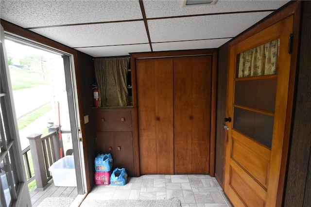 entryway featuring plenty of natural light and a paneled ceiling