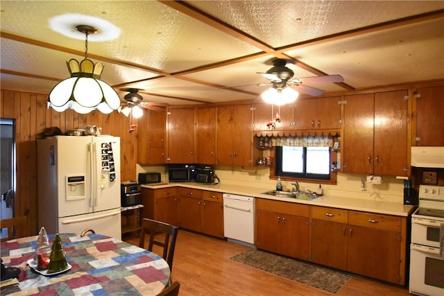 kitchen featuring white appliances, a ceiling fan, ventilation hood, and a sink
