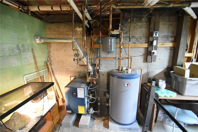 utility room with gas water heater and a heating unit