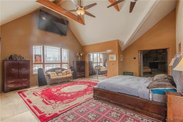 bedroom featuring access to outside, high vaulted ceiling, ceiling fan, and beam ceiling
