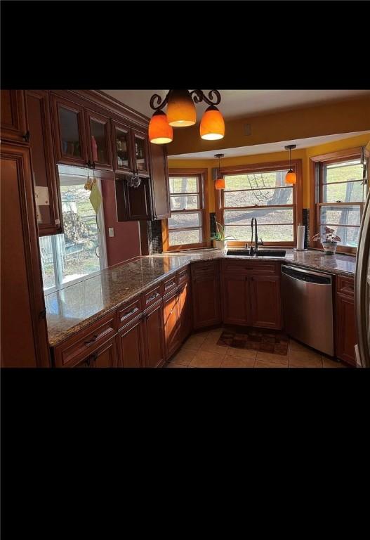 2 Park Pl, Delhi, NY 13753 - kitchen featuring a sink, light tile patterned floors, dishwasher, and a healthy amount of sunlight