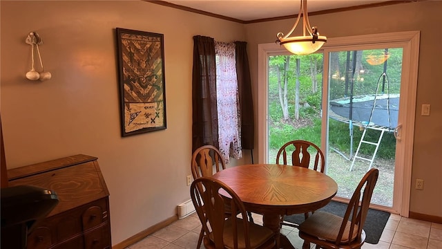 2 Park Pl, Delhi, NY 13753 - dining space featuring light tile patterned floors, baseboards, and crown molding