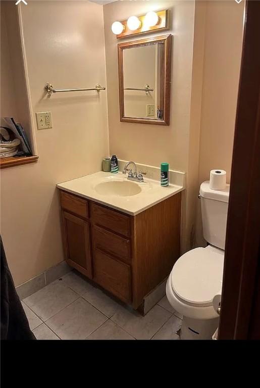 2 Park Pl, Delhi, NY 13753 - half bathroom with vanity, tile patterned floors, and toilet