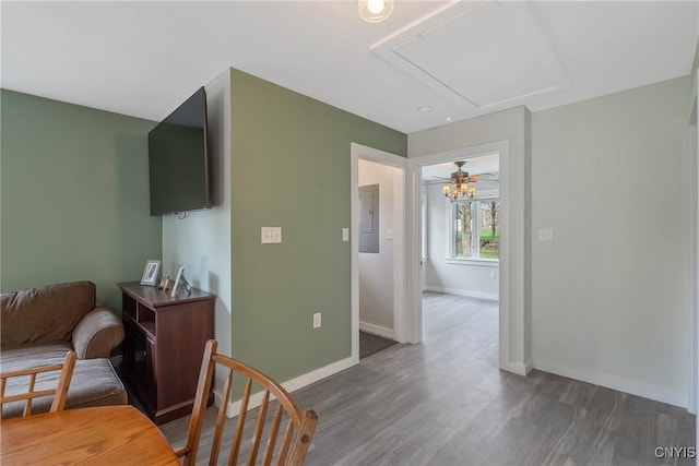 216 Harry Bryant Rd, Amboy, NY 13493 - dining room with attic access, wood finished floors, baseboards, and electric panel