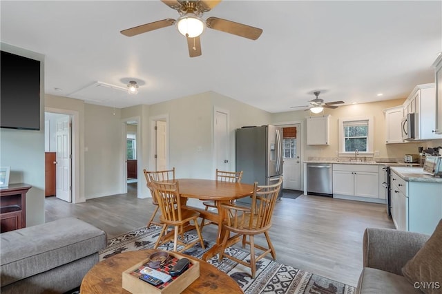 216 Harry Bryant Rd, Amboy, NY 13493 - living area featuring attic access, ceiling fan, and light wood-type flooring