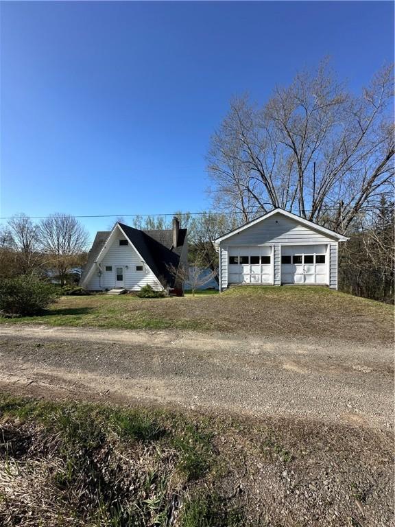 detached garage with driveway