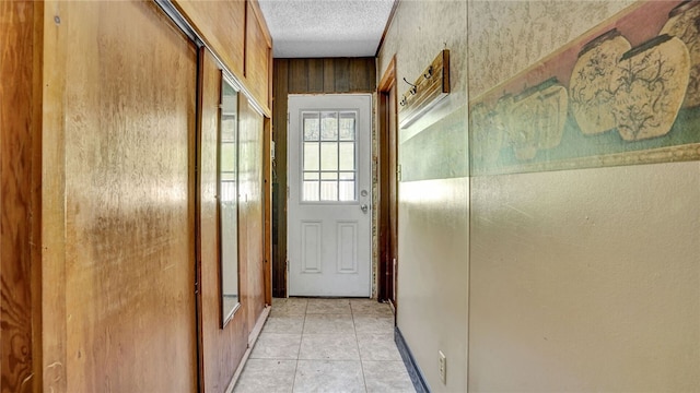 1029 Barden, Eldred, PA 16731 - doorway featuring a textured ceiling and light tile patterned flooring