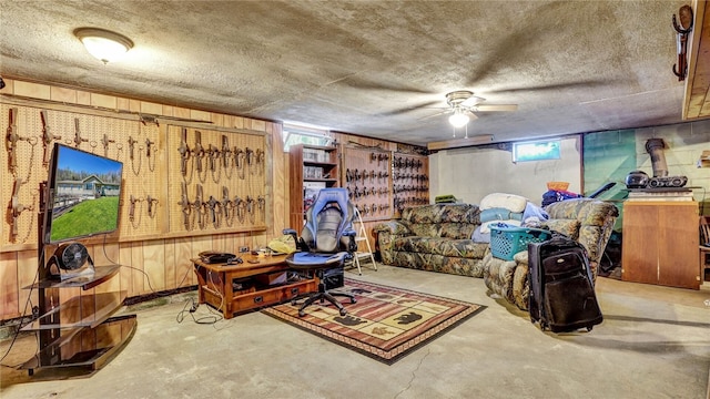 1029 Barden, Eldred, PA 16731 - interior space with concrete flooring, wooden walls, and ceiling fan