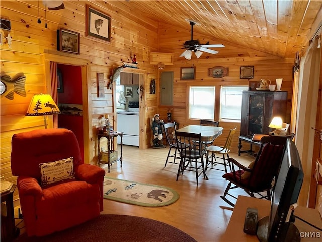 23183 Kitto Marina Dr, Brownville, NY 13634 - dining area with wood walls, wood finished floors, wood ceiling, a ceiling fan, and vaulted ceiling