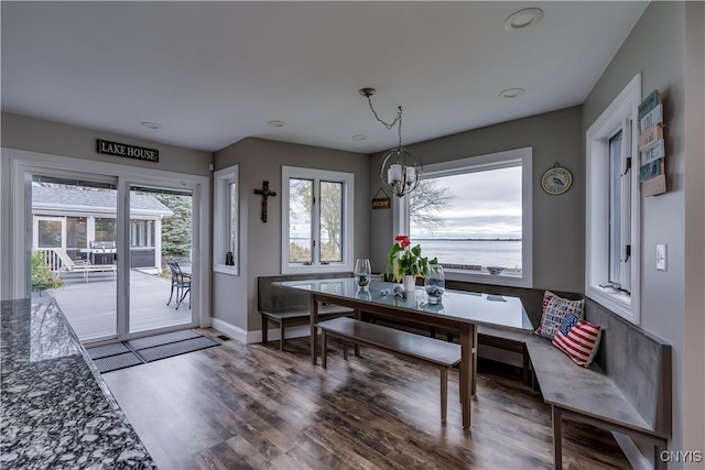 25524 County Route 57, Lyme, NY 13693 - dining space with an inviting chandelier, recessed lighting, baseboards, and wood finished floors