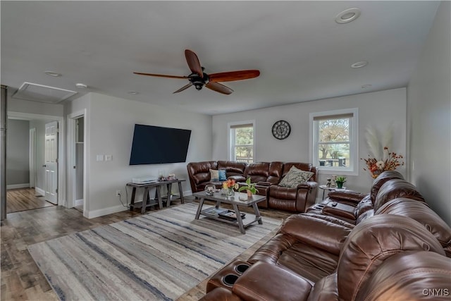 25524 County Route 57, Lyme, NY 13693 - living area with ceiling fan, attic access, recessed lighting, baseboards, and wood finished floors
